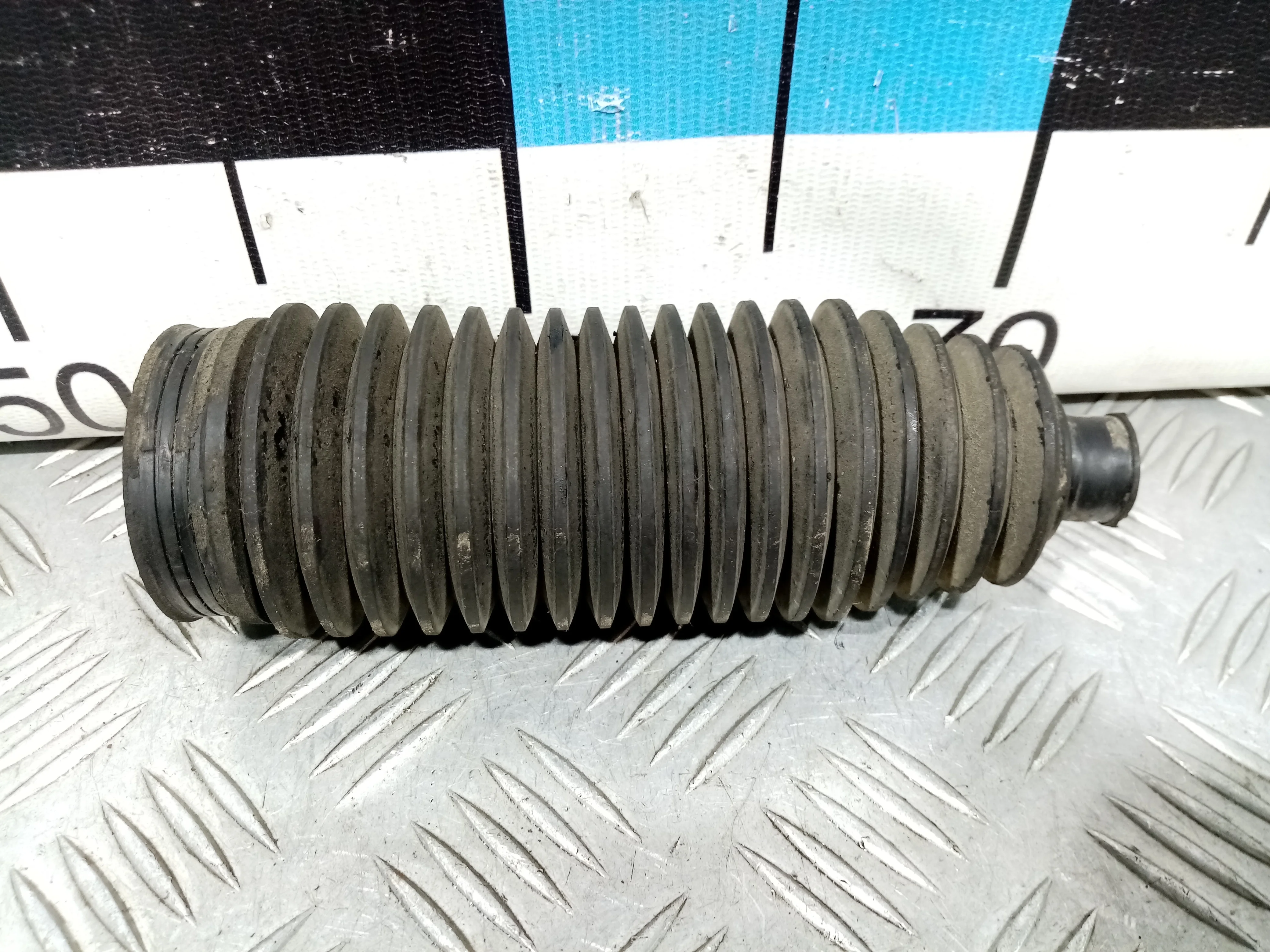 [Б/У] Пыльник рулевой рейки [Код: 00390980 ]