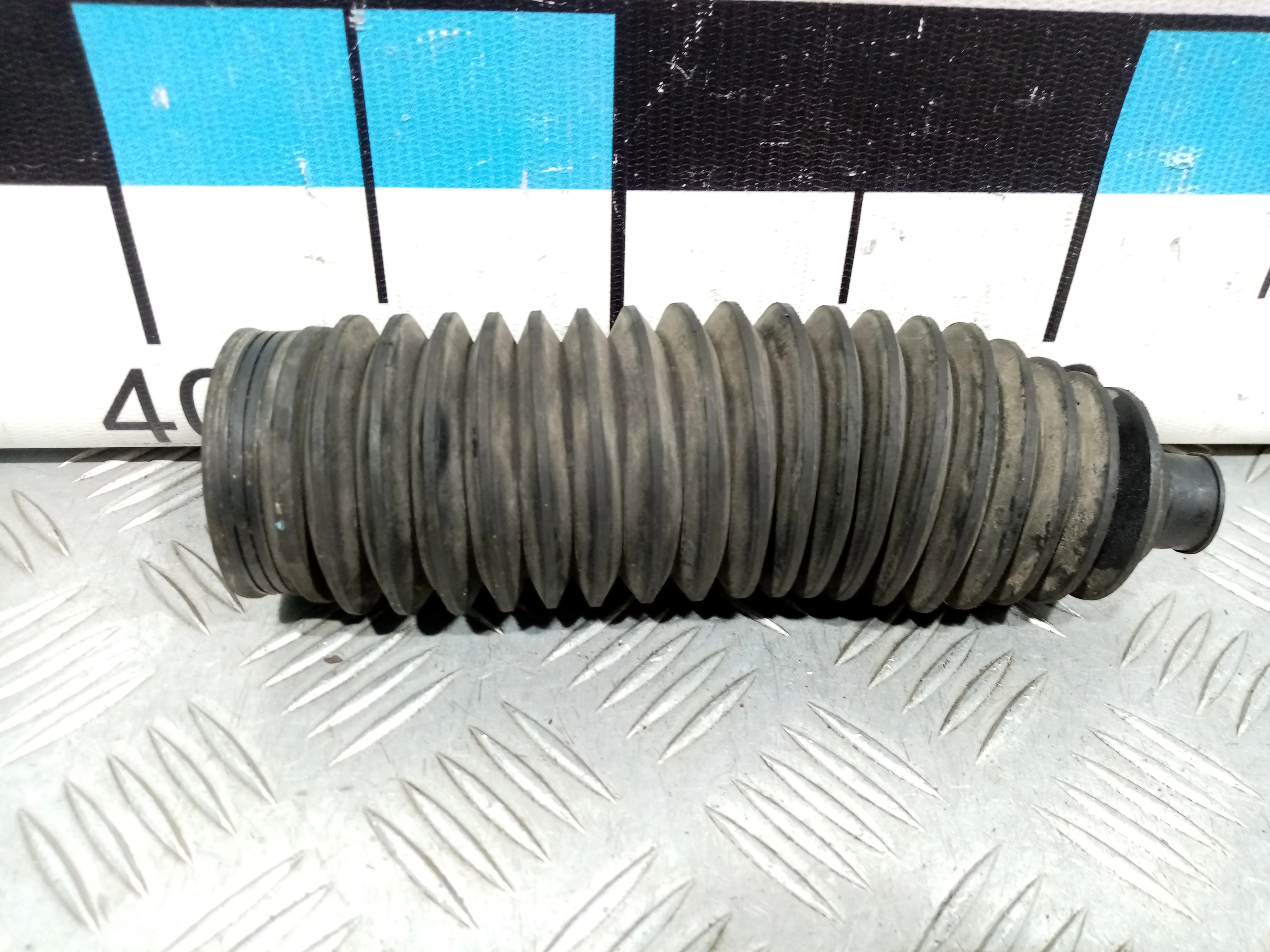 [Б/У] Пыльник рулевой рейки [Код: 00390981 ]