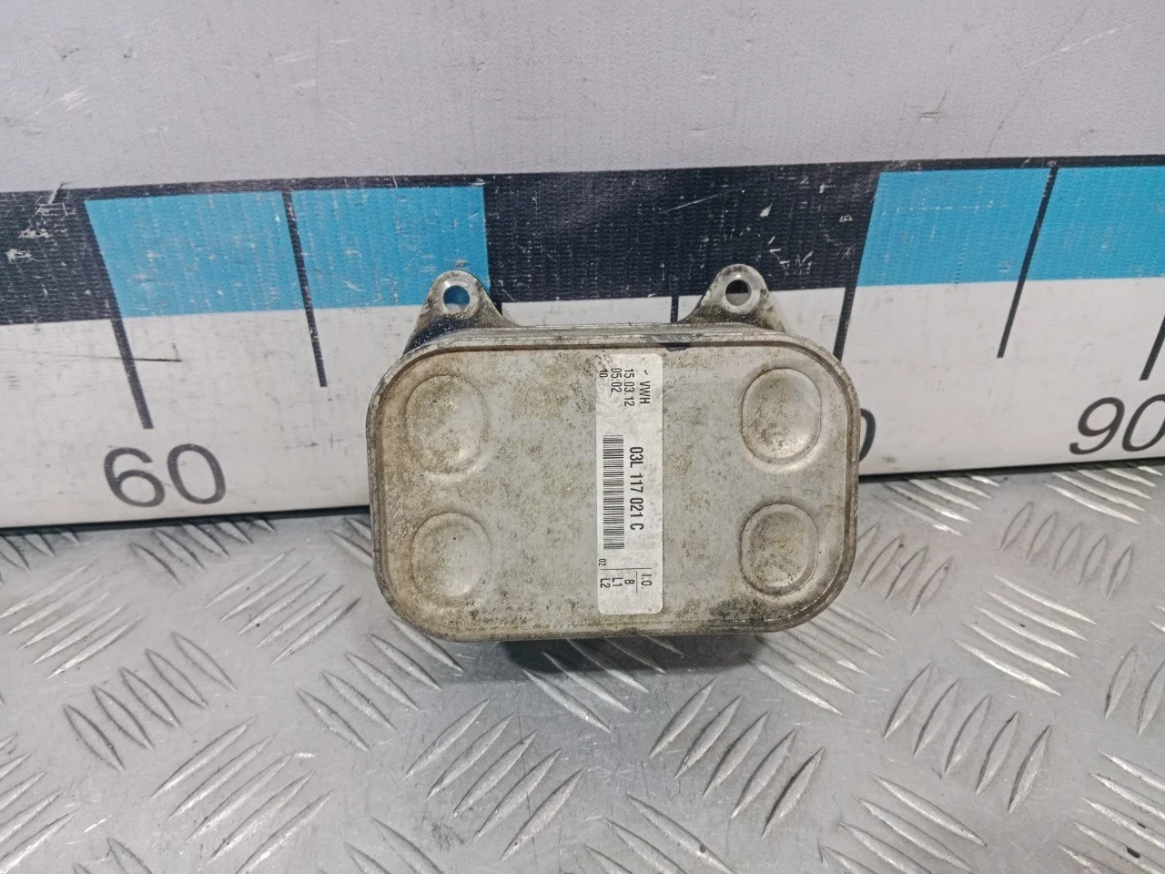 [Б/У] Радиатор масляный VAG [Код: 00582558 ]