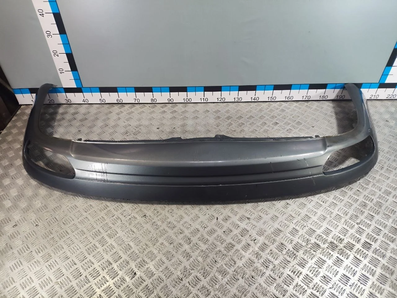 [Б/У] Спойлер заднего бампера Audi A8 - Глубокие царапины на пластике [ХОРОШЕЕ] [Код: 00612652 ]