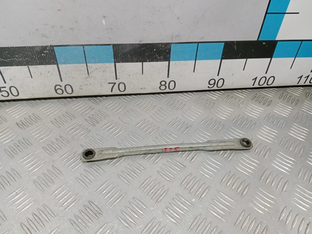 [Б/У] Тяга трапеции стеклоочистителя левая Fabia Roomster [Код: 00610985 ]