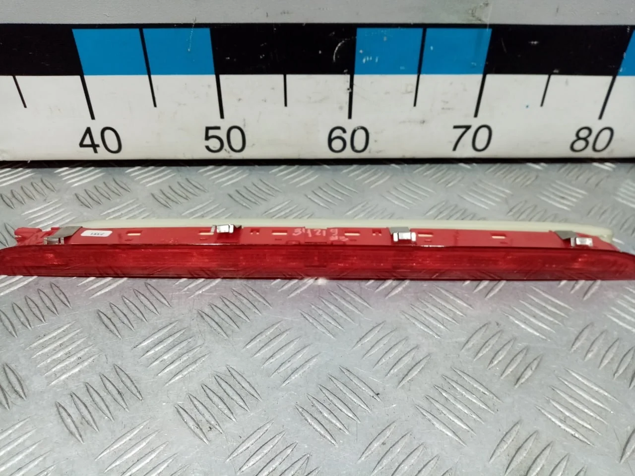 [Б/У] Фонарь задний стоп сигнал - Незначительная трещина [Незначительные дефекты] [Код: 00670201 ]