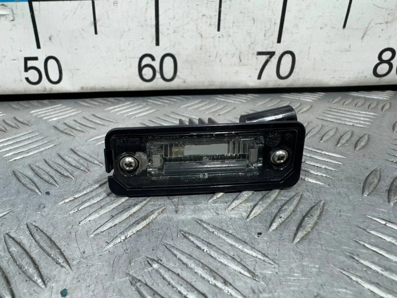 [Б/У] Фонарь подсветки номера VAG [Код: 00509258 ]