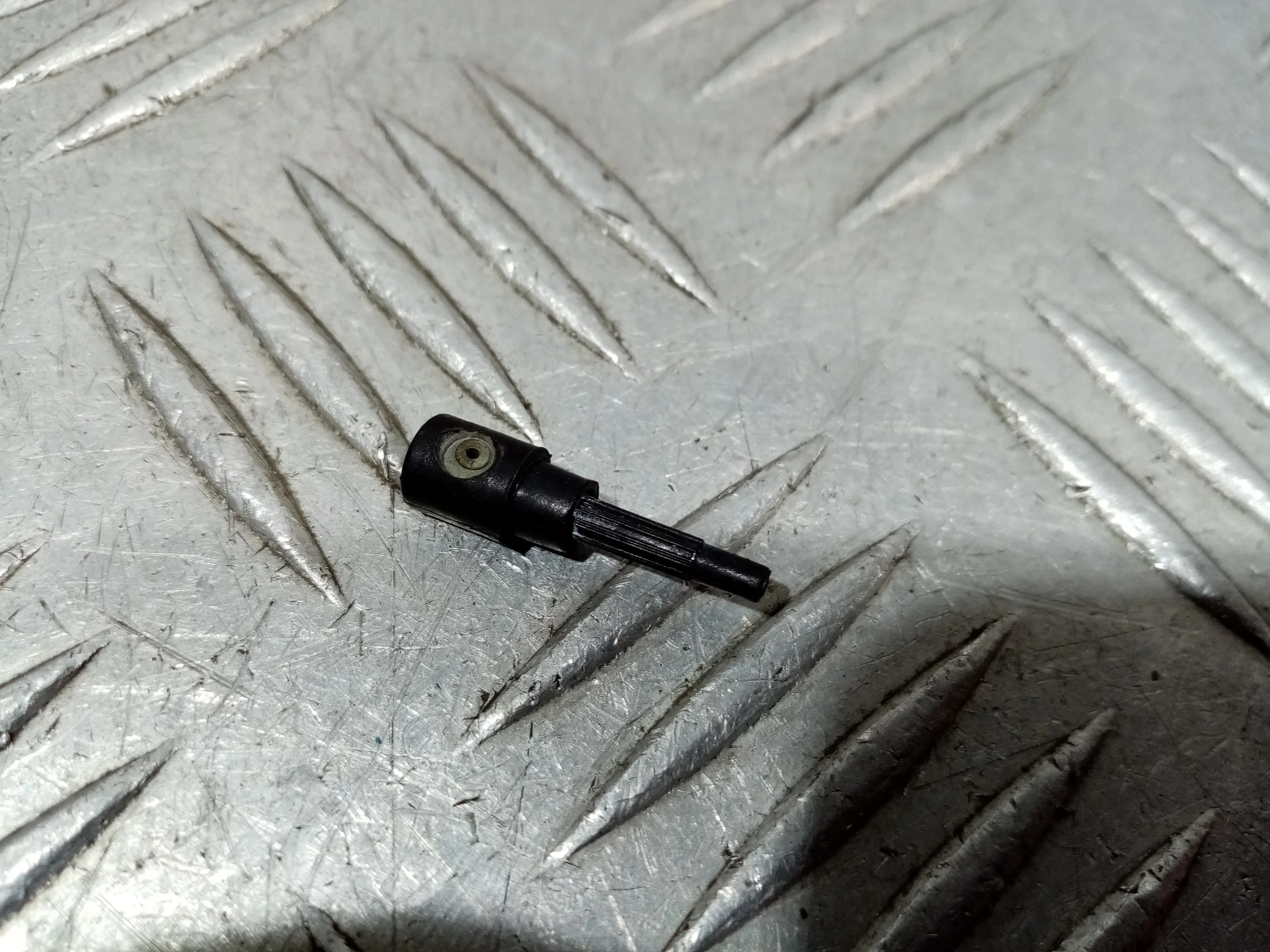 [Б/У] Форсунка омывателя заднего стекла [Код: 00678990 ]