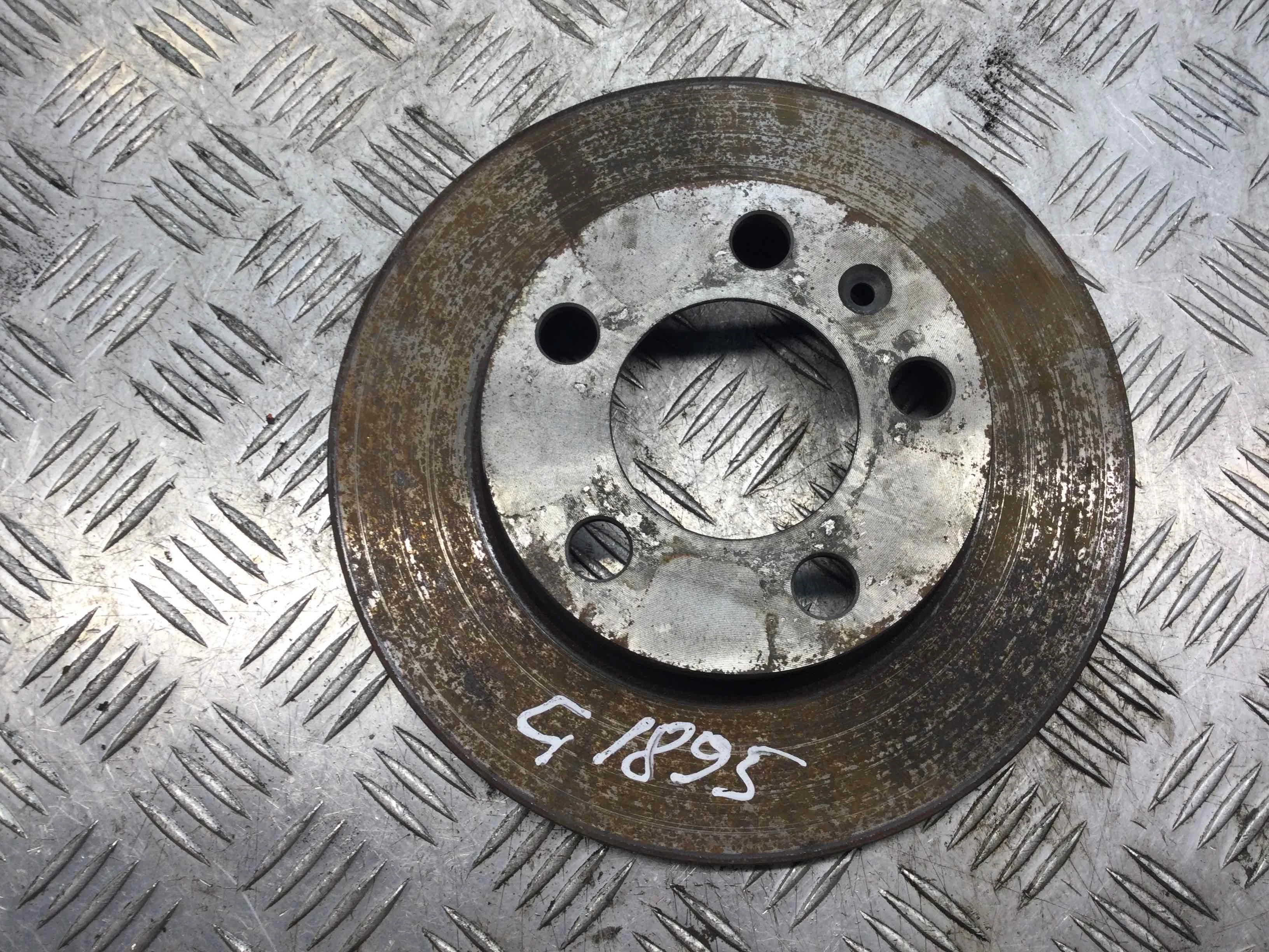 Диск тормозной задний Volkswagen Golf 4 поколение (1997-2004) бензин 1.4 i Механика Х/б