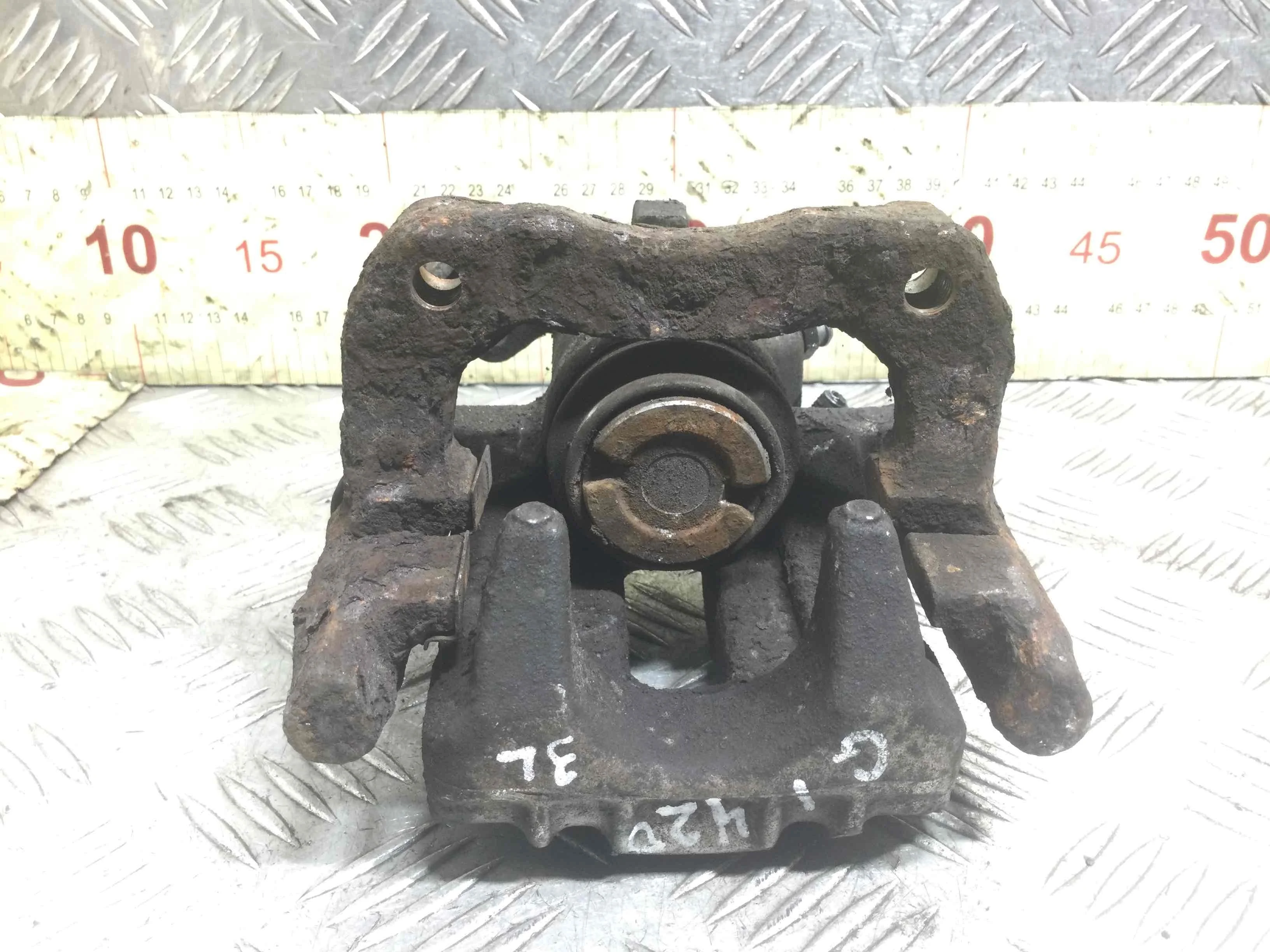 Суппорт задний левый Volkswagen Golf 4 поколение (1997-2004) бензин 1.6 i Механика Х/б