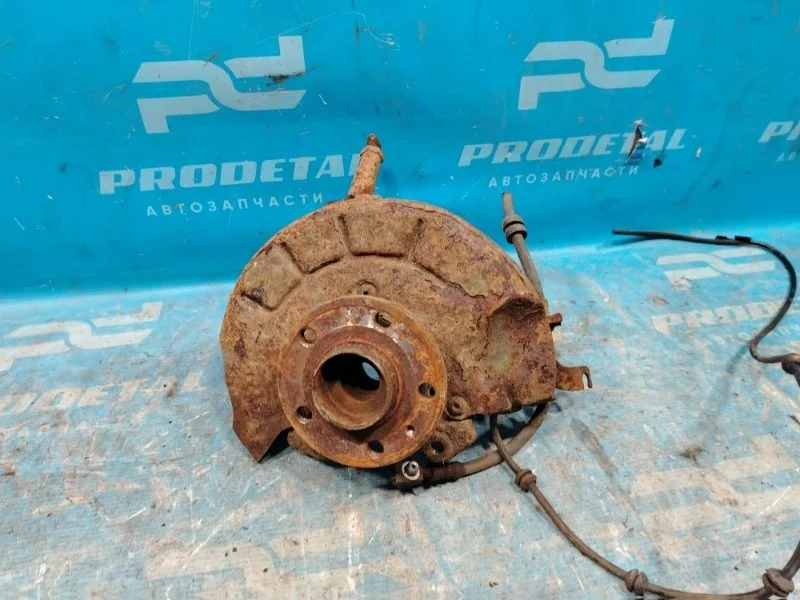 Кулак поворотный передний левый Skoda Rapid