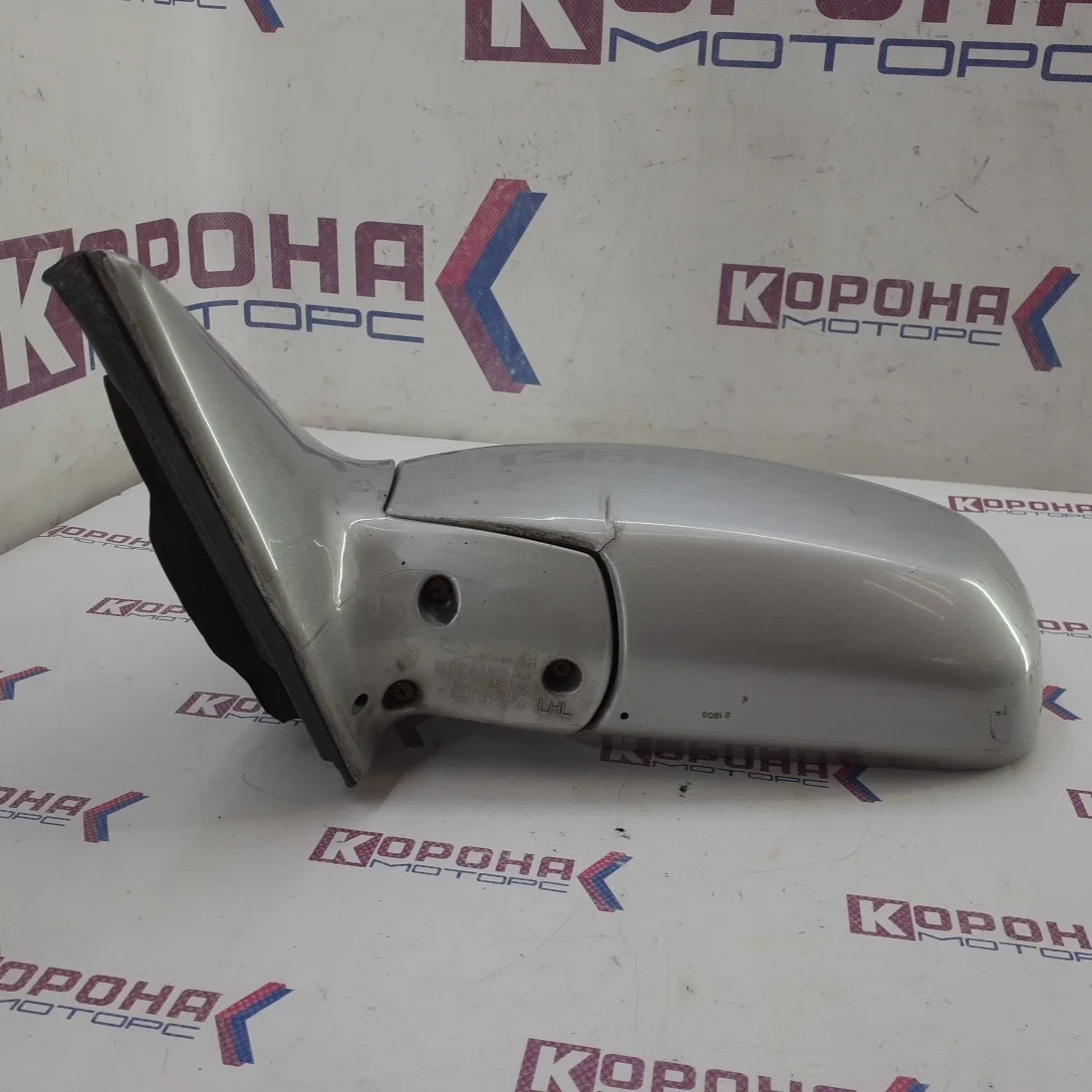 Зеркало левое Б/У цвет серебро,потертости,7 конт