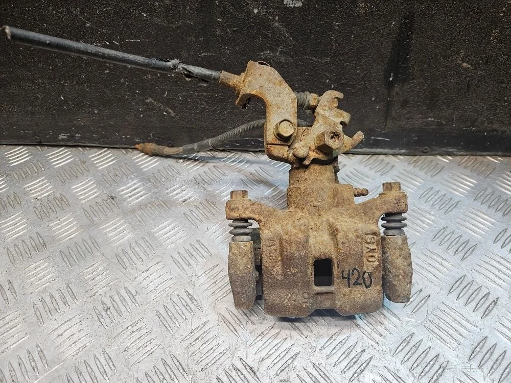 Суппорт тормозной задний левый на Mazda 6 GH