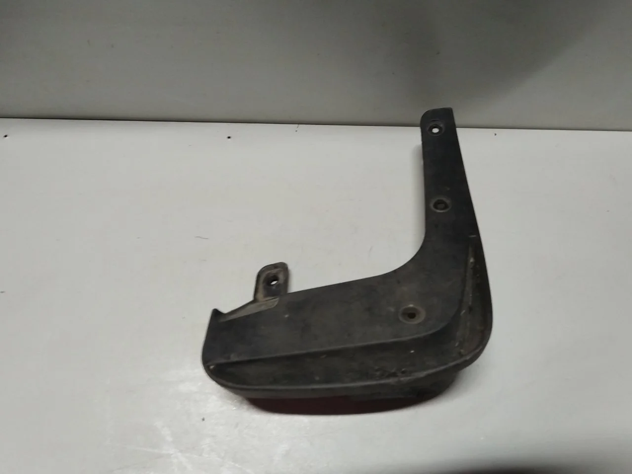 Брызговик Hyundai ix35 2009-2013 868312S000, передний левый