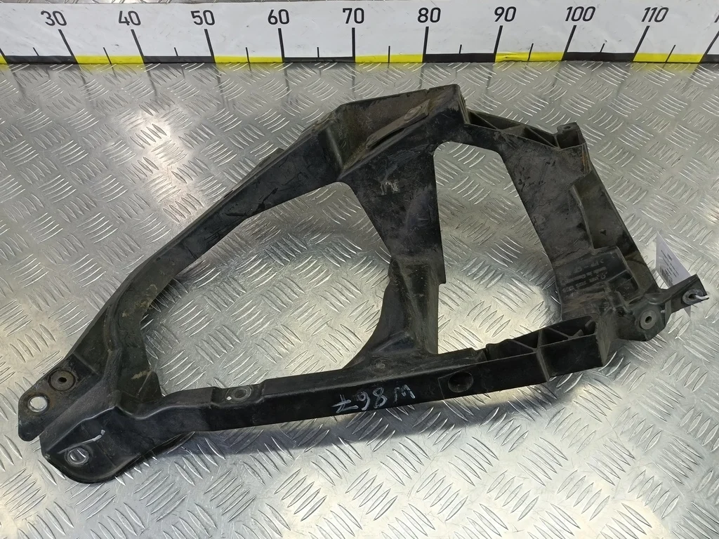 Кронштейн фары левой MITSUBISHI COLT Z30 (2002—20