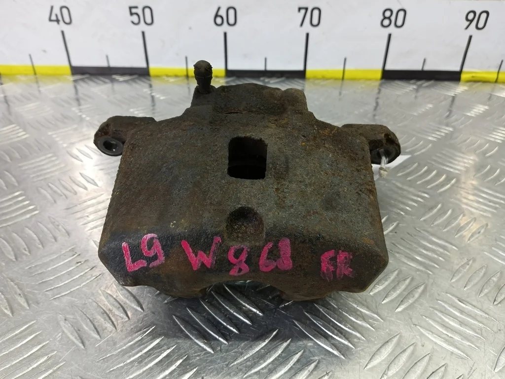 Суппорт передний правый MITSUBISHI LANCER IX рест