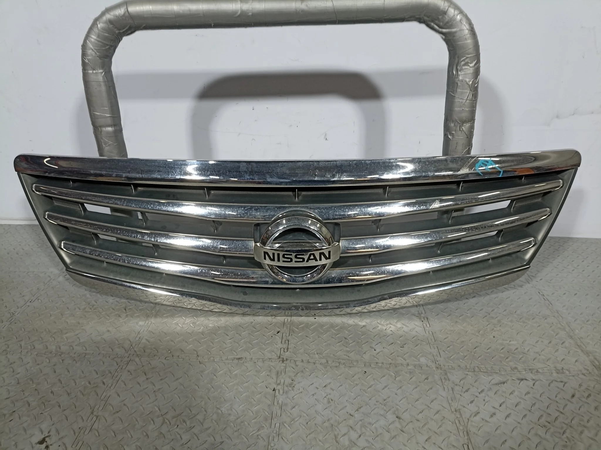 РЕШЕТКА РАДИАТОРА NISSAN 62310JN00A QA6478