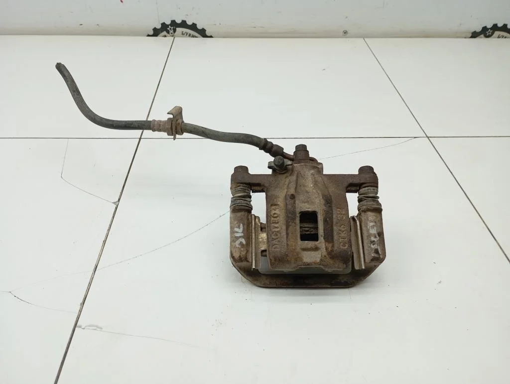 Суппорт задний левый Chevrolet Lacetti 2007 J200