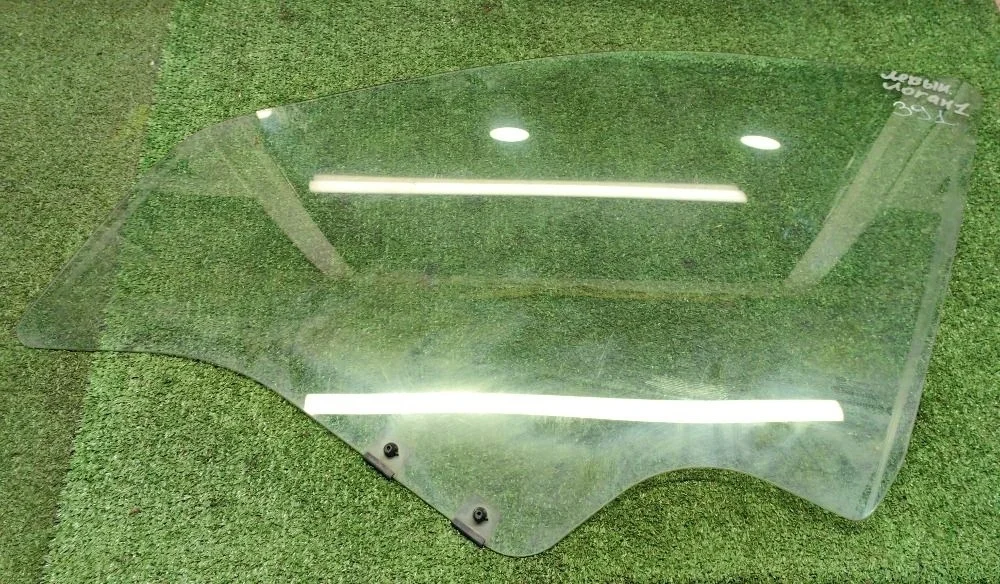 Стекло двери передней левой Renault Logan 1