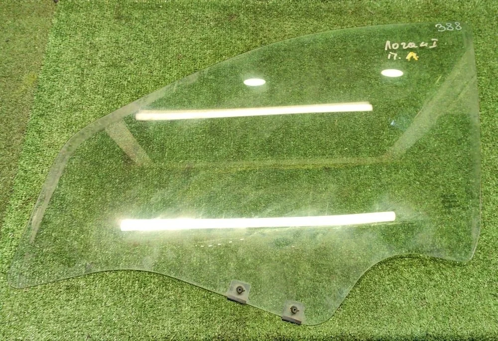 Стекло двери передней левой Renault Logan 1