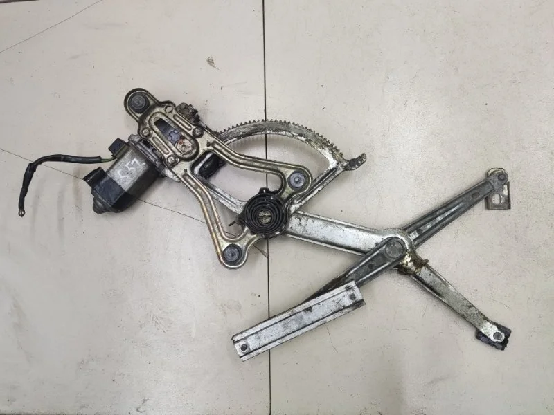 Стеклоподъемник элект. передний левый