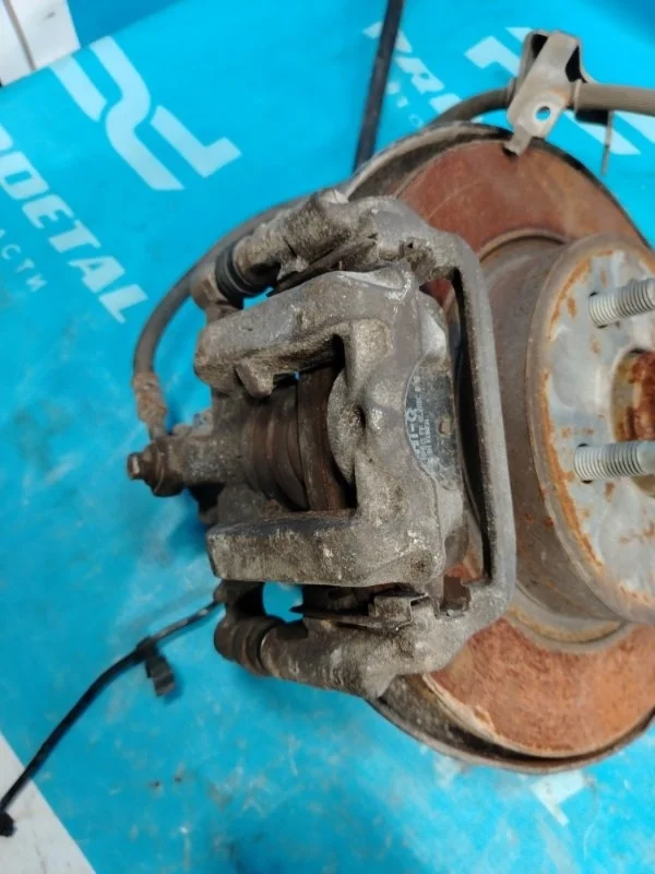 Суппорт тормозной задний левый Opel Astra H