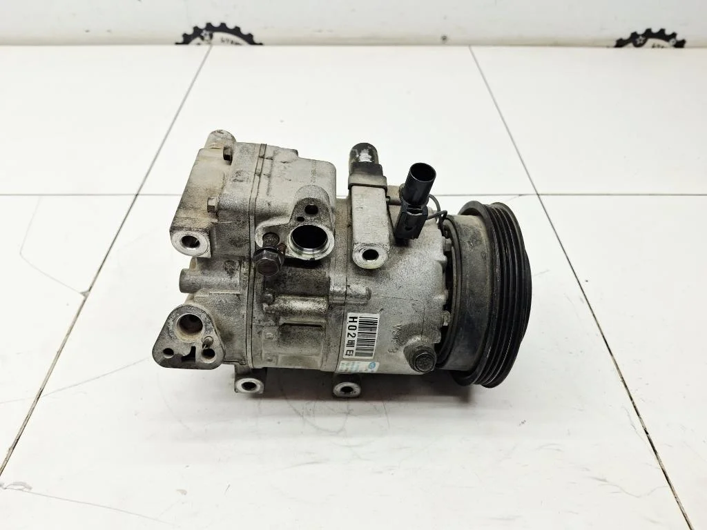 Компрессор кондиционера Hyundai Tucson JM