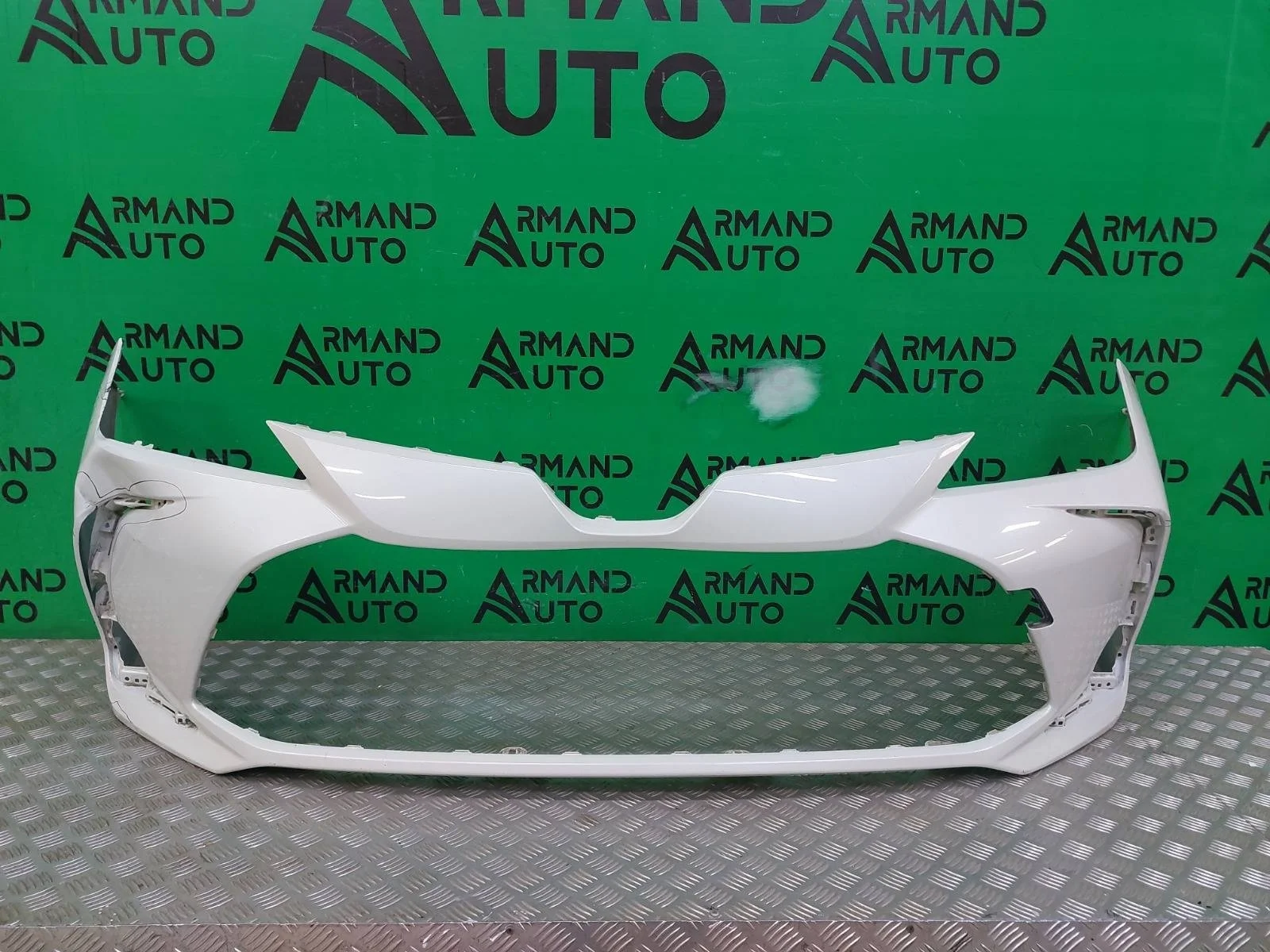 Бампер Toyota Corolla 2018-нв 12 E210