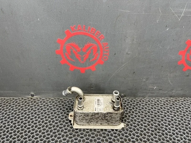 Радиатор масляный Volvo XC70 2008 31201911 2.4 D5244T4