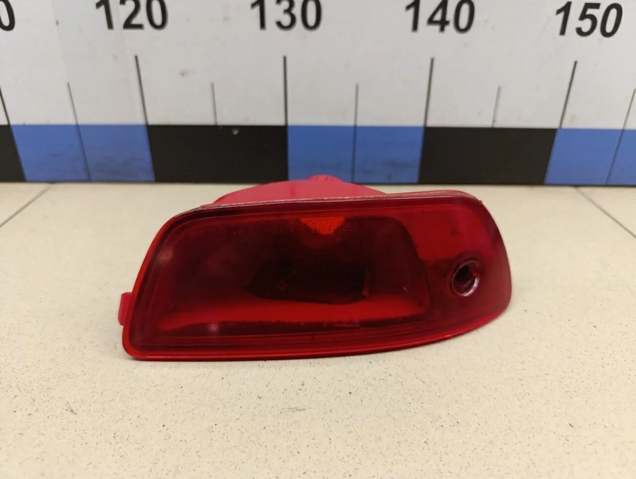 Фонарь задний в бампер левый Matrix 2001-2010