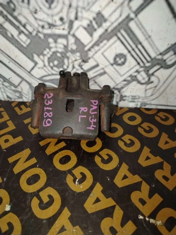 Суппорт Mitsubishi Pajero 4 2009 MR510541 V85W, задний левый