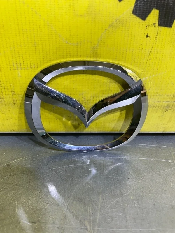 Эмблема Mazda 3 C23551731A BM 1.6