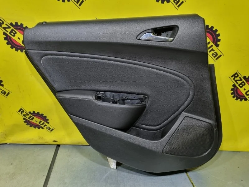 Обшивка двери Opel Astra 13258735 J, задняя левая