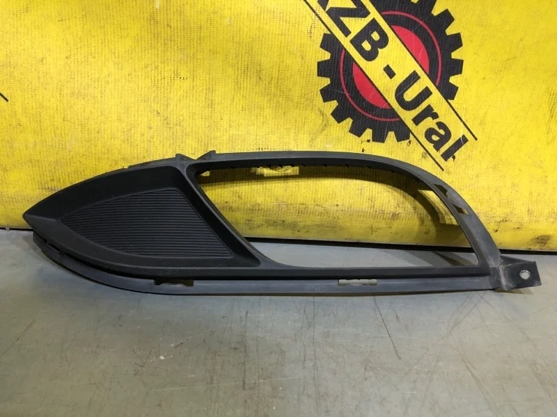 Накладка противотуманной фары Kia Cerato 86563A7010 YD, передняя левая