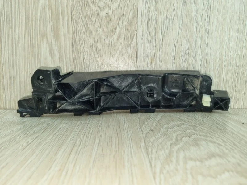 Кронштейн бампера Hyundai ix35 865132Y000, передний левый