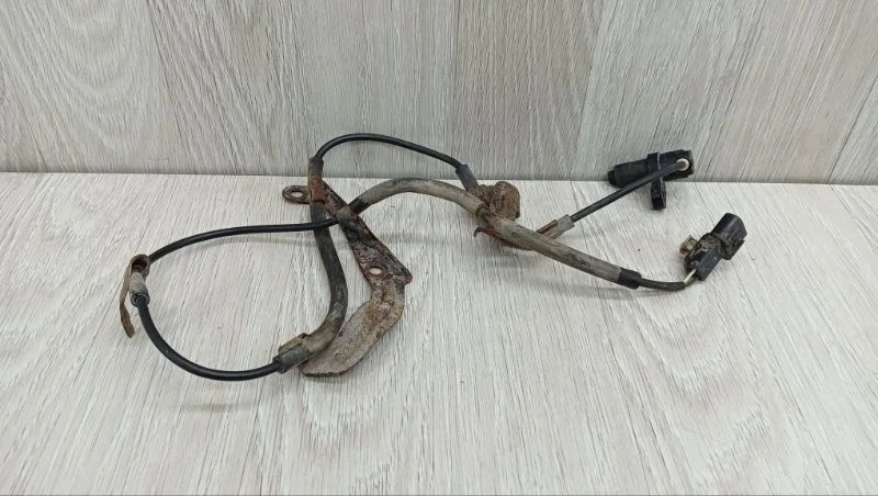 Датчик ABS Mitsubishi L200 MN102573, передний левый