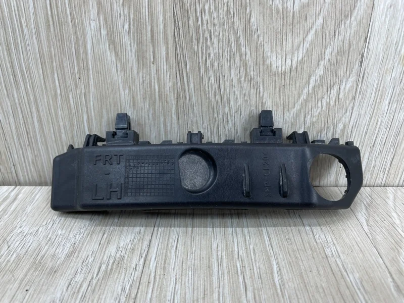 Кронштейн бампера Kia Cerato 86513A7000 YD, передний левый