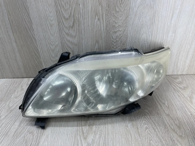 Фара Toyota Corolla 2006-2012 8117012A60 E150, передняя левая