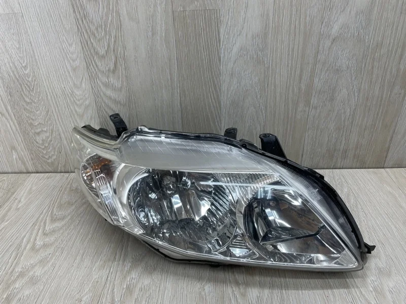 Фара Toyota Corolla 8113012A60 E150, правая