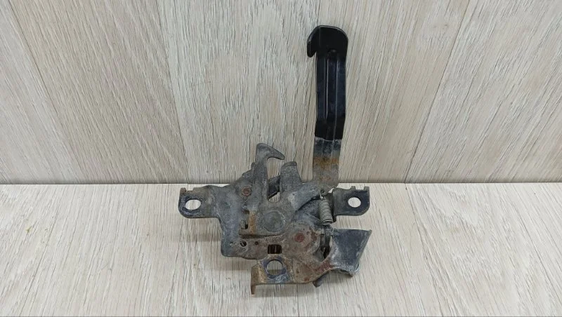 Замок капота Toyota Corolla 5351012890 E150