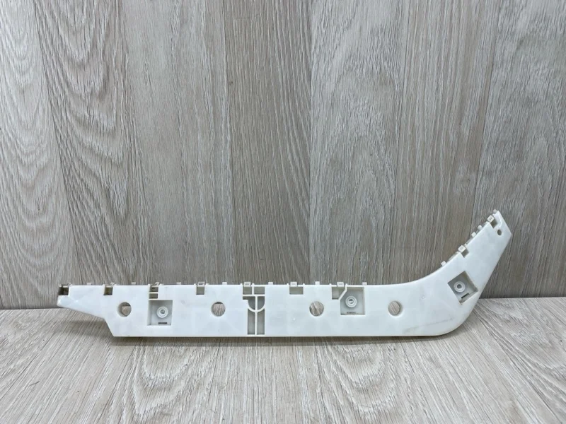 Кронштейн бампера Nissan Patrol 852211LA0A Y62, задний левый