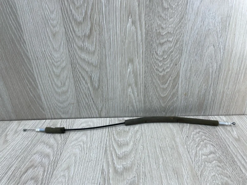 Трос замка двери Nissan Patrol 805011LA0A Y62, передний левый