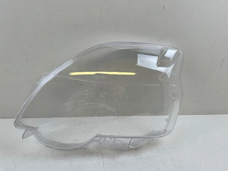 Стекло фары Nissan X-trail 2010-2013 260603UF0C T31, левое