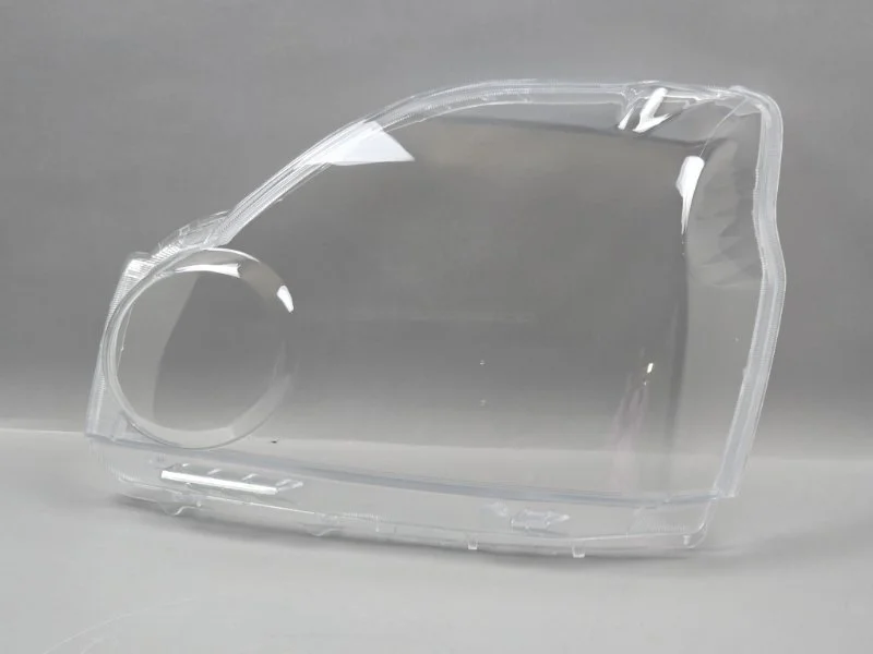 Стекло фары Nissan X-Trail 2007-2011 26060JG40A T31, переднее левое