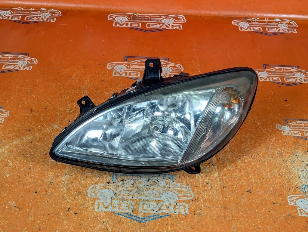 Фара левая Mercedes-Benz