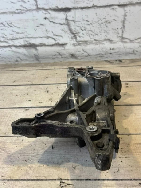 Кронштейн масляного фильтра VW Passat 2012 B7