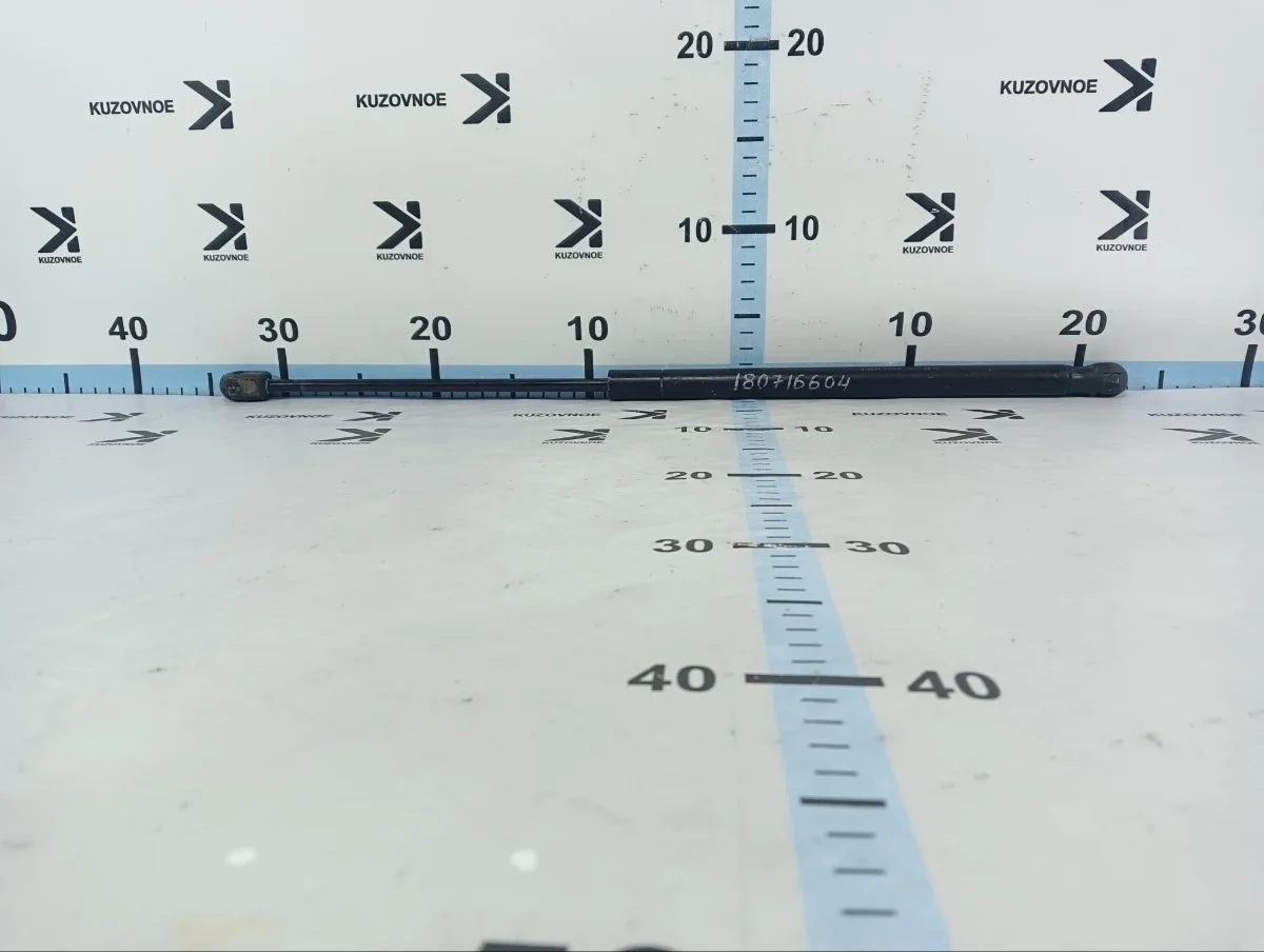 Амортизатор капота Volvo XC90 2009