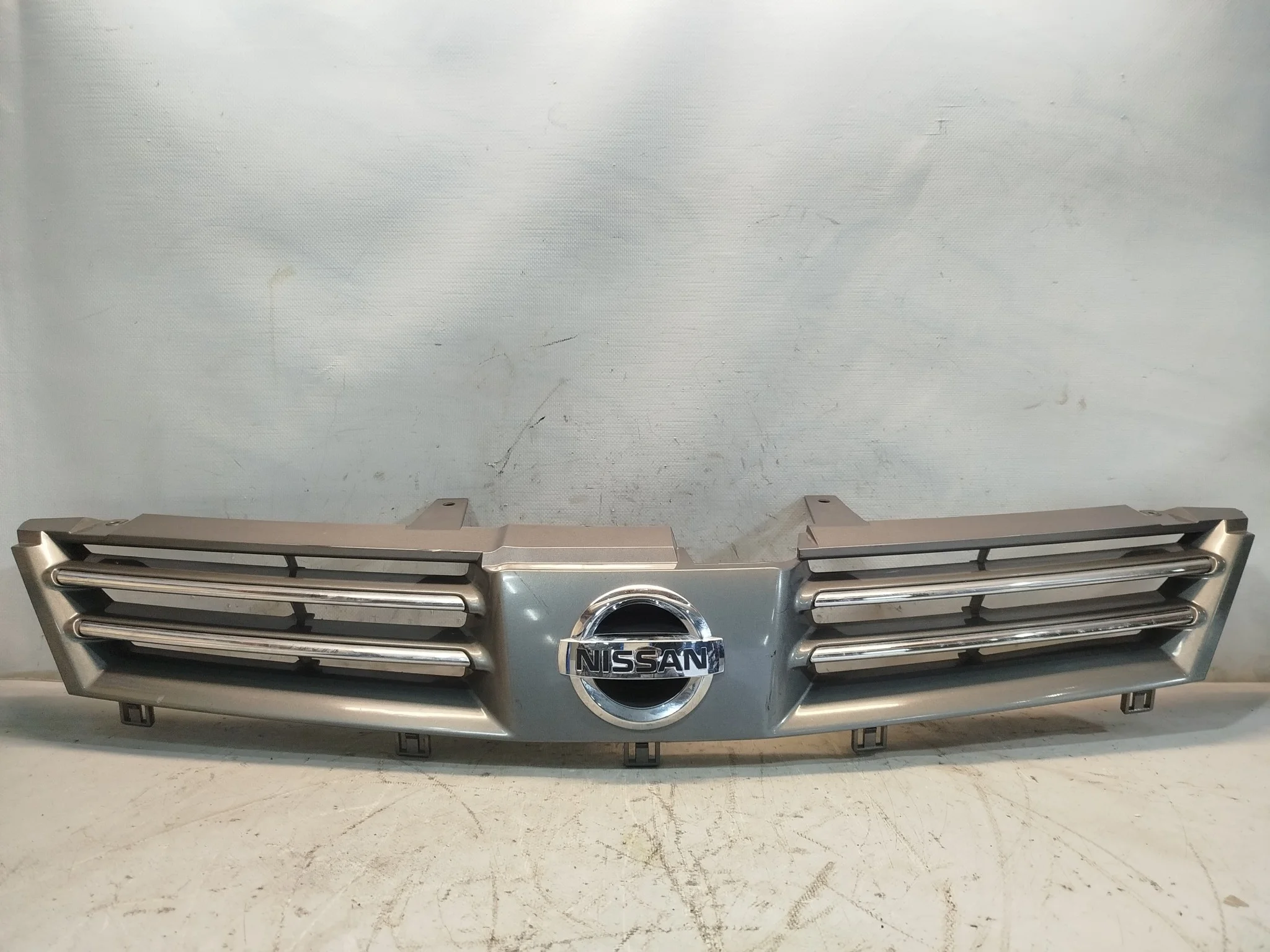 РЕШЕТКА РАДИАТОРА NISSAN 62310WE000 XA6491Z