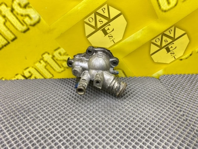 Корпус термостата Nissan Primera 2004 212006N210 P12 QR20