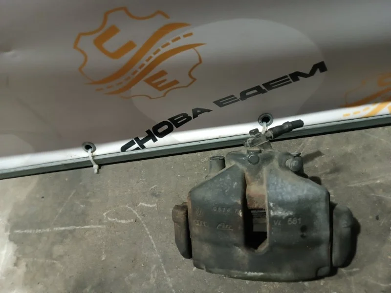 Суппорт тормозной Volkswagen Eos 1K0615123E BPY 2.0, передний левый