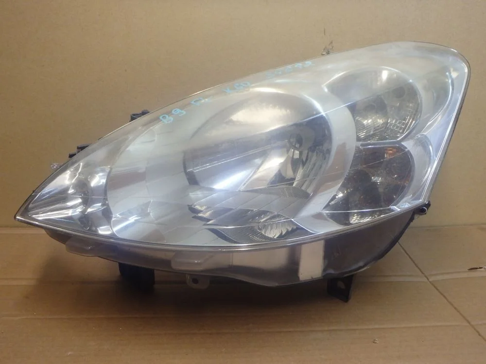 Фара левая Peugeot-Citroen 6208K5 Partner II (2008—2012)