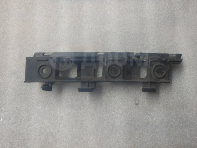 Кронштейн переднего бампера правый VAG 3C0807184 Passat B6 (2005—2010)