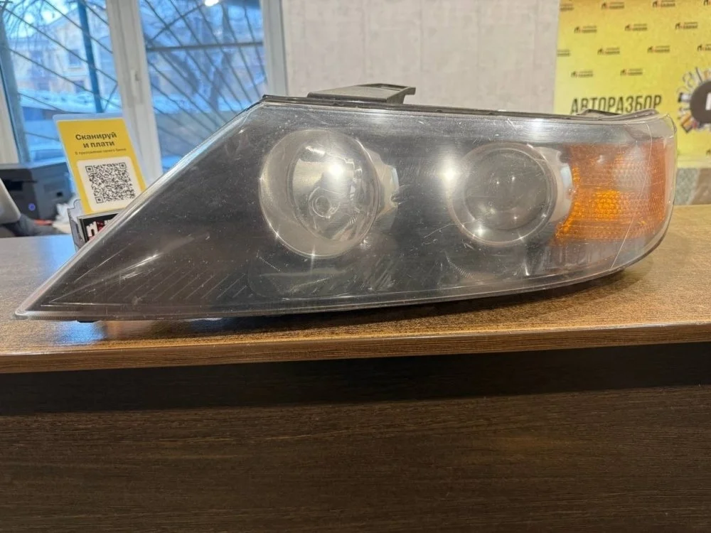 Фара Kia Sorento 921012P080, левая