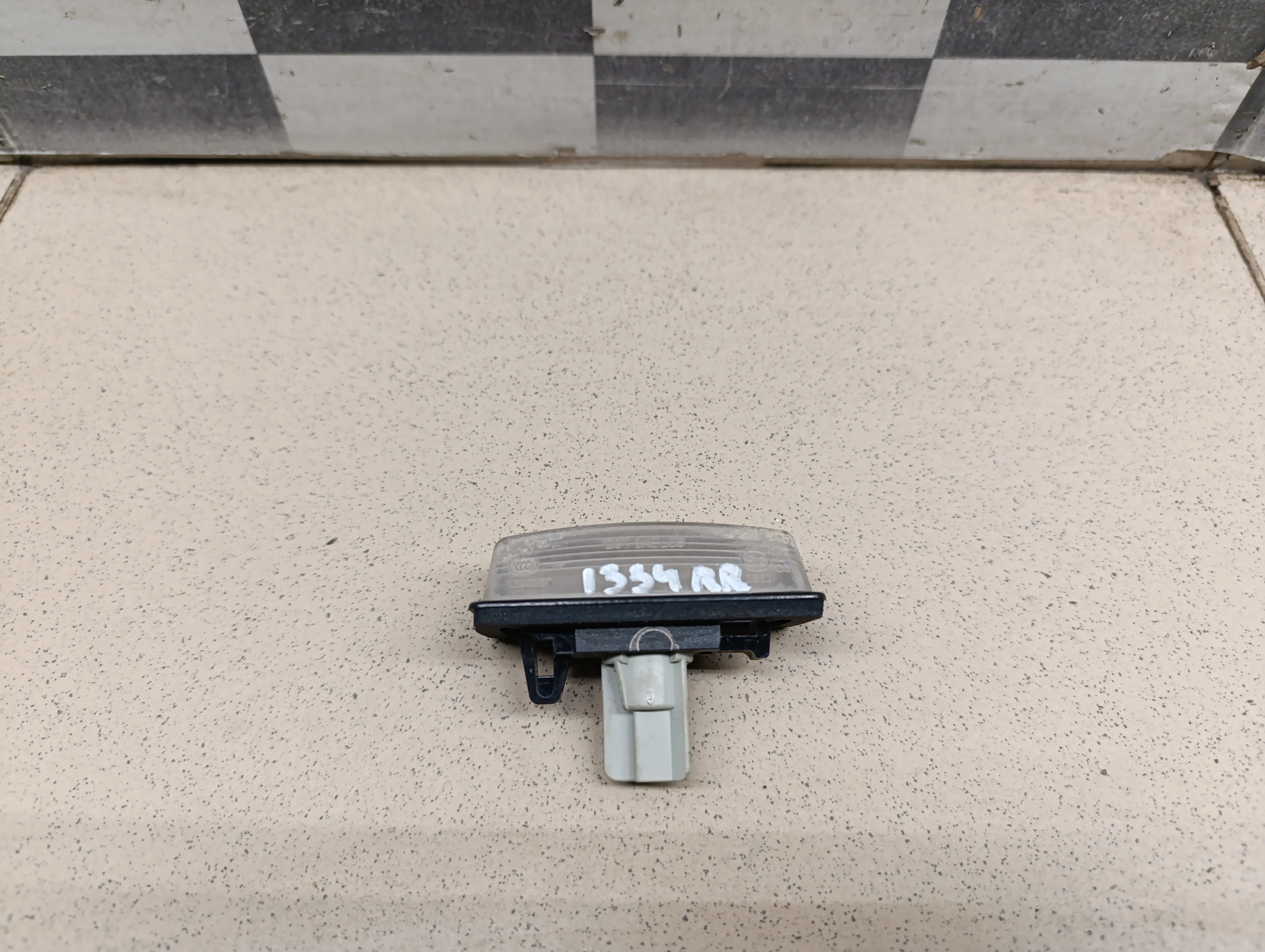 Фонарь подсветки номера Almera (G15) 2013>